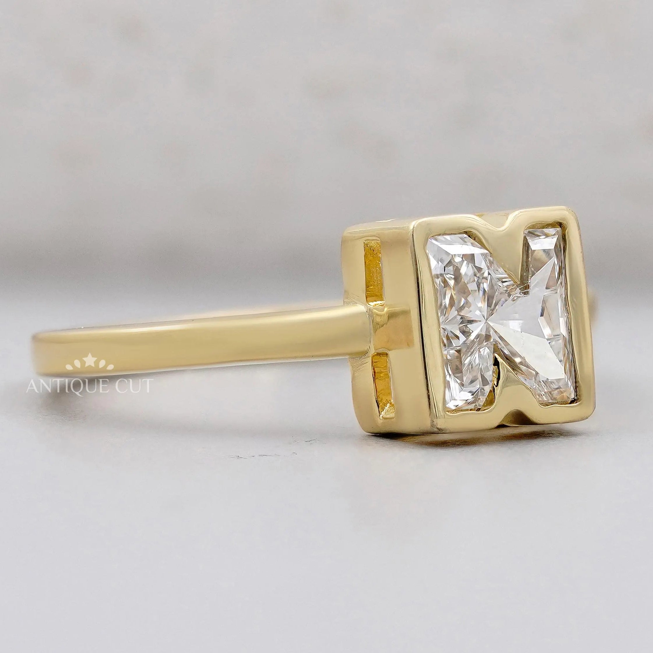 IGI certified N letter diamond ring yellow gold