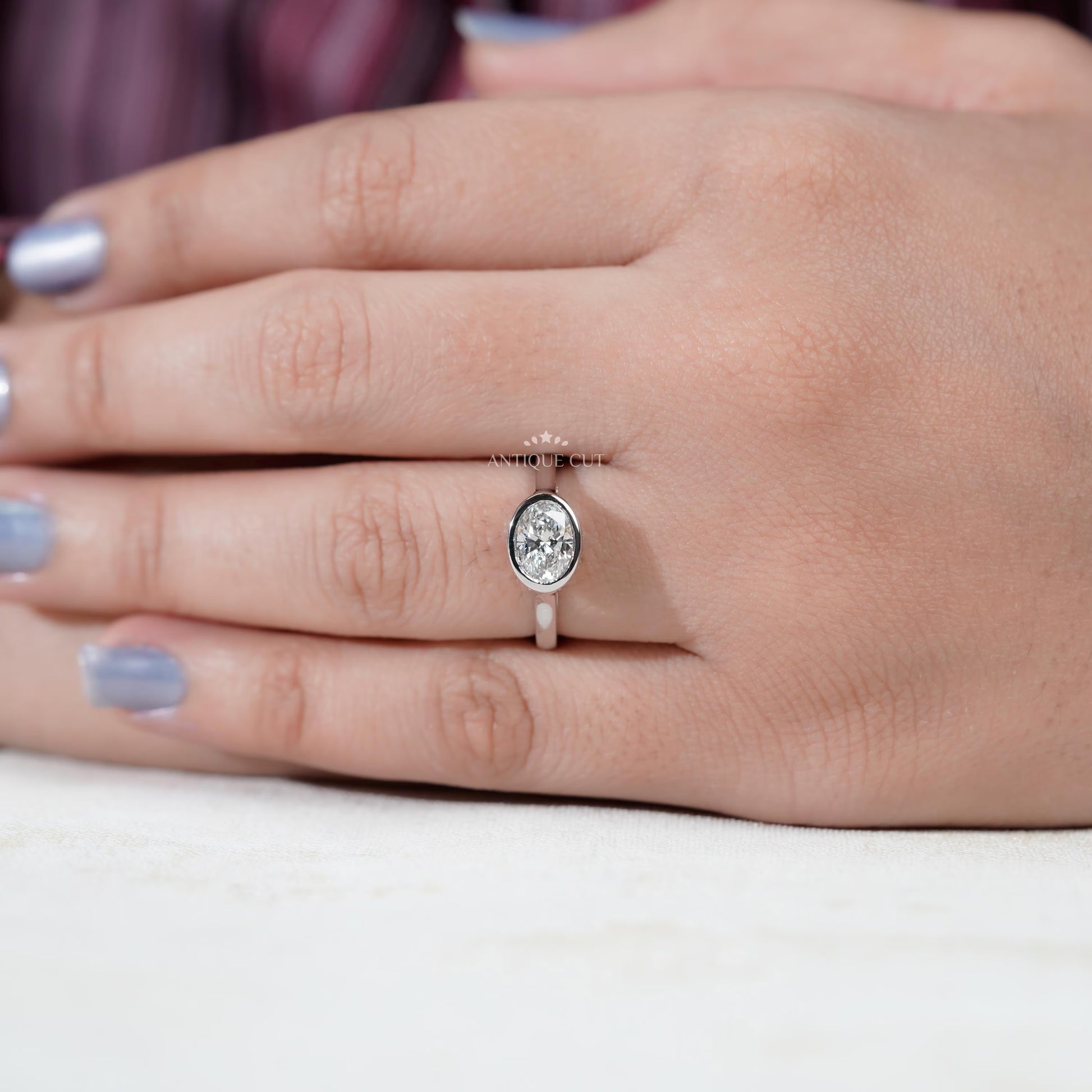 Minimalist east west oval diamond ring white gold