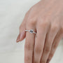 Modern white gold emerald cut engagement ring
