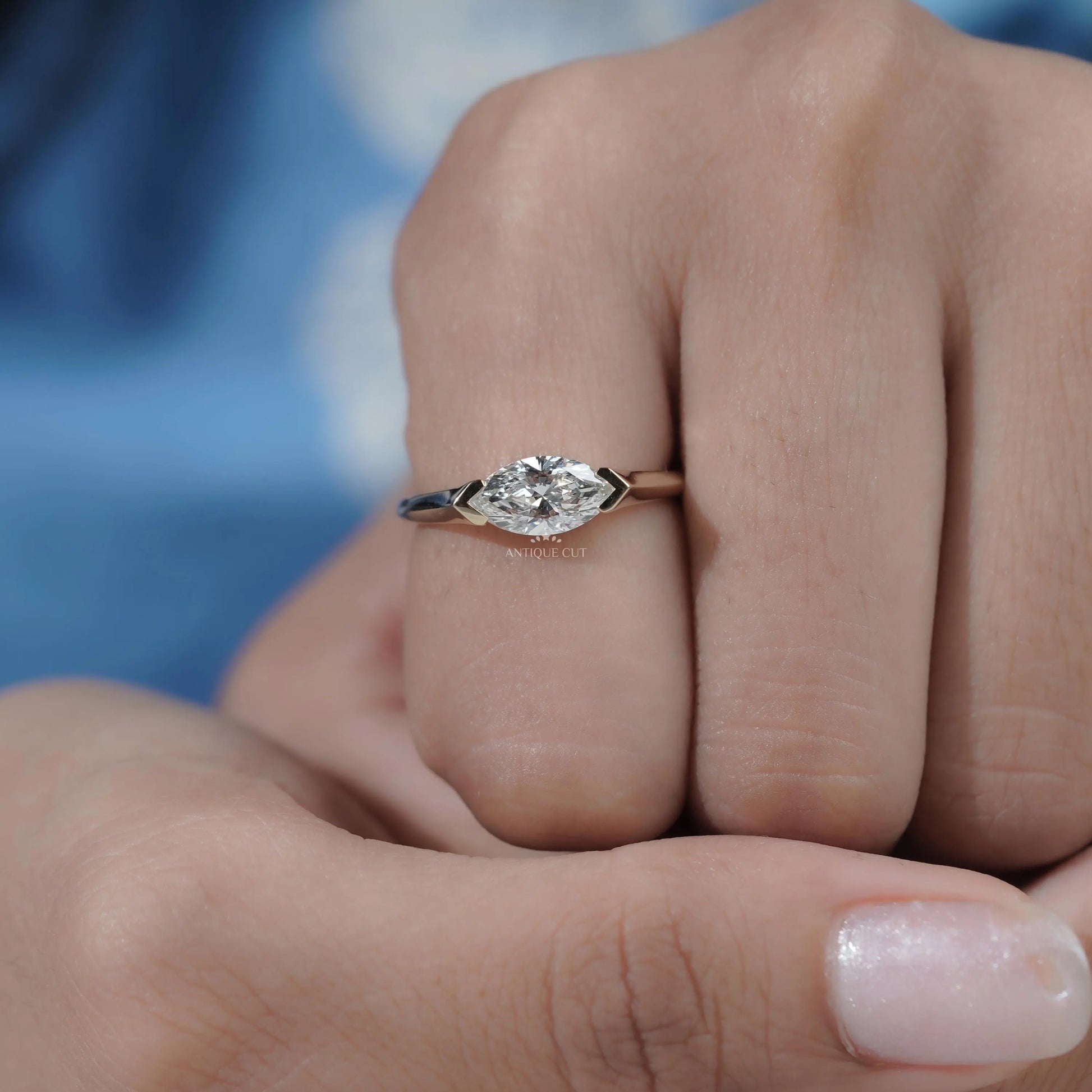 Fine jewelry marquise solitaire ring with yellow gold setting