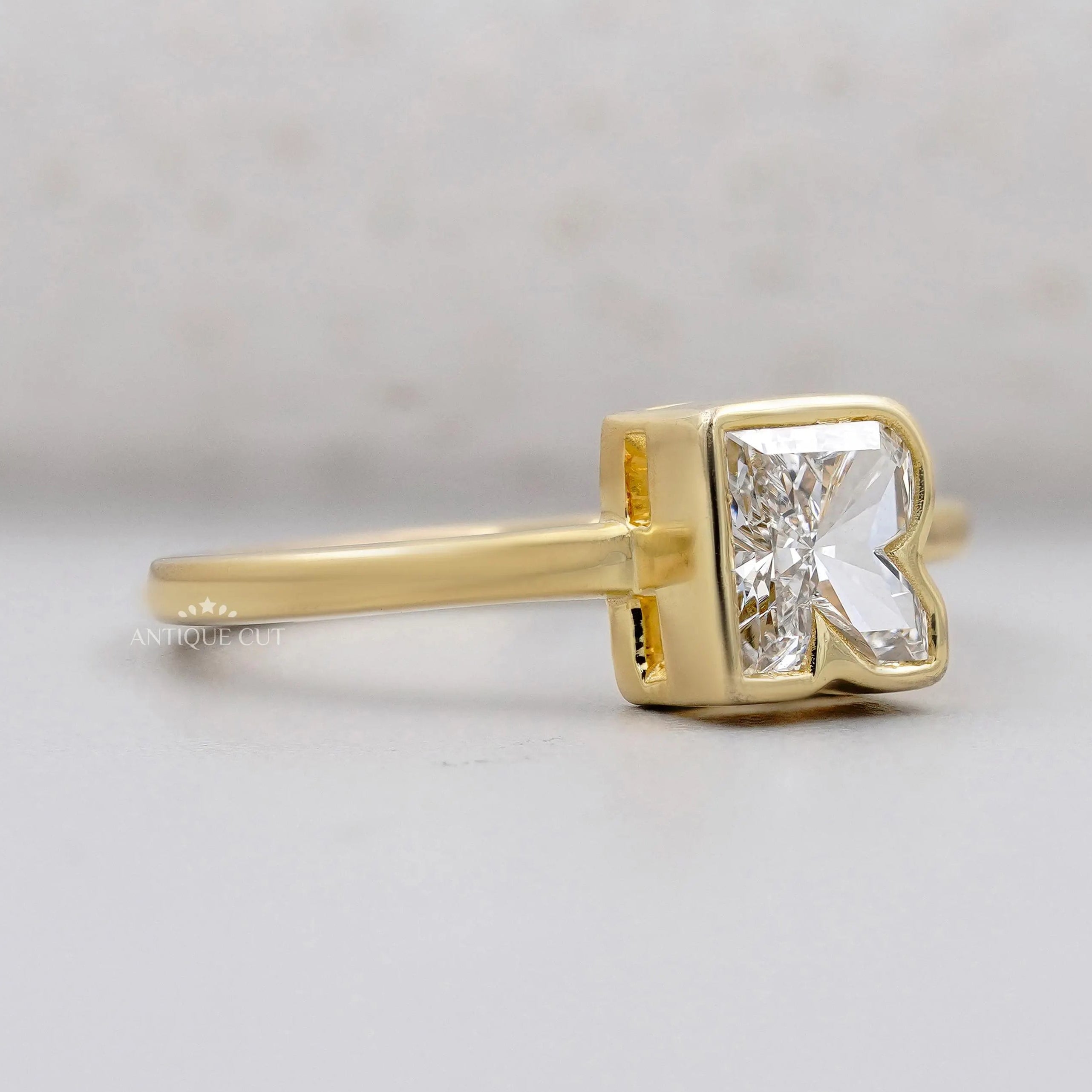 Antique cut R letter diamond ring yellow gold