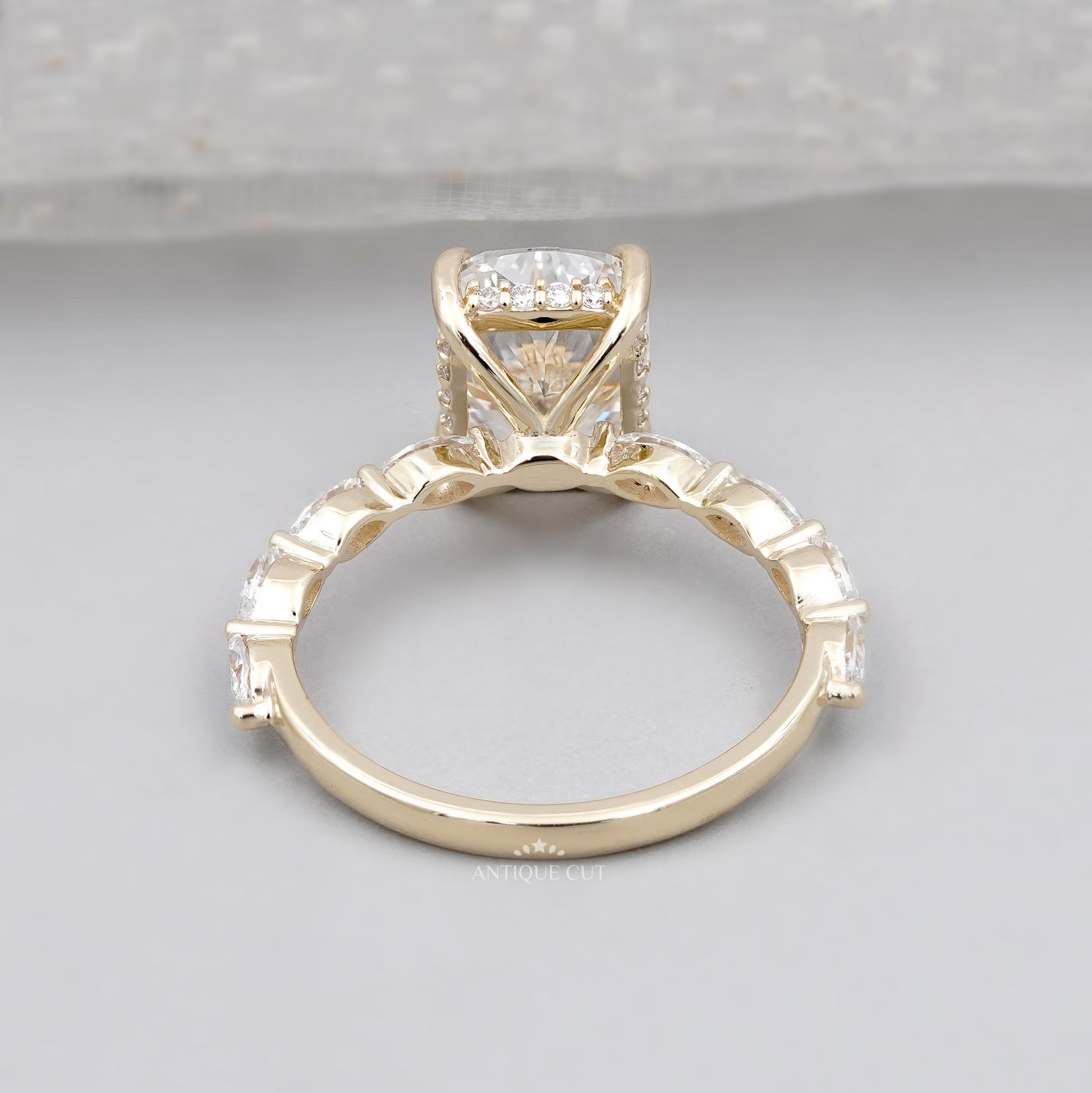 Cushion cut diamond ring in yellow gold
