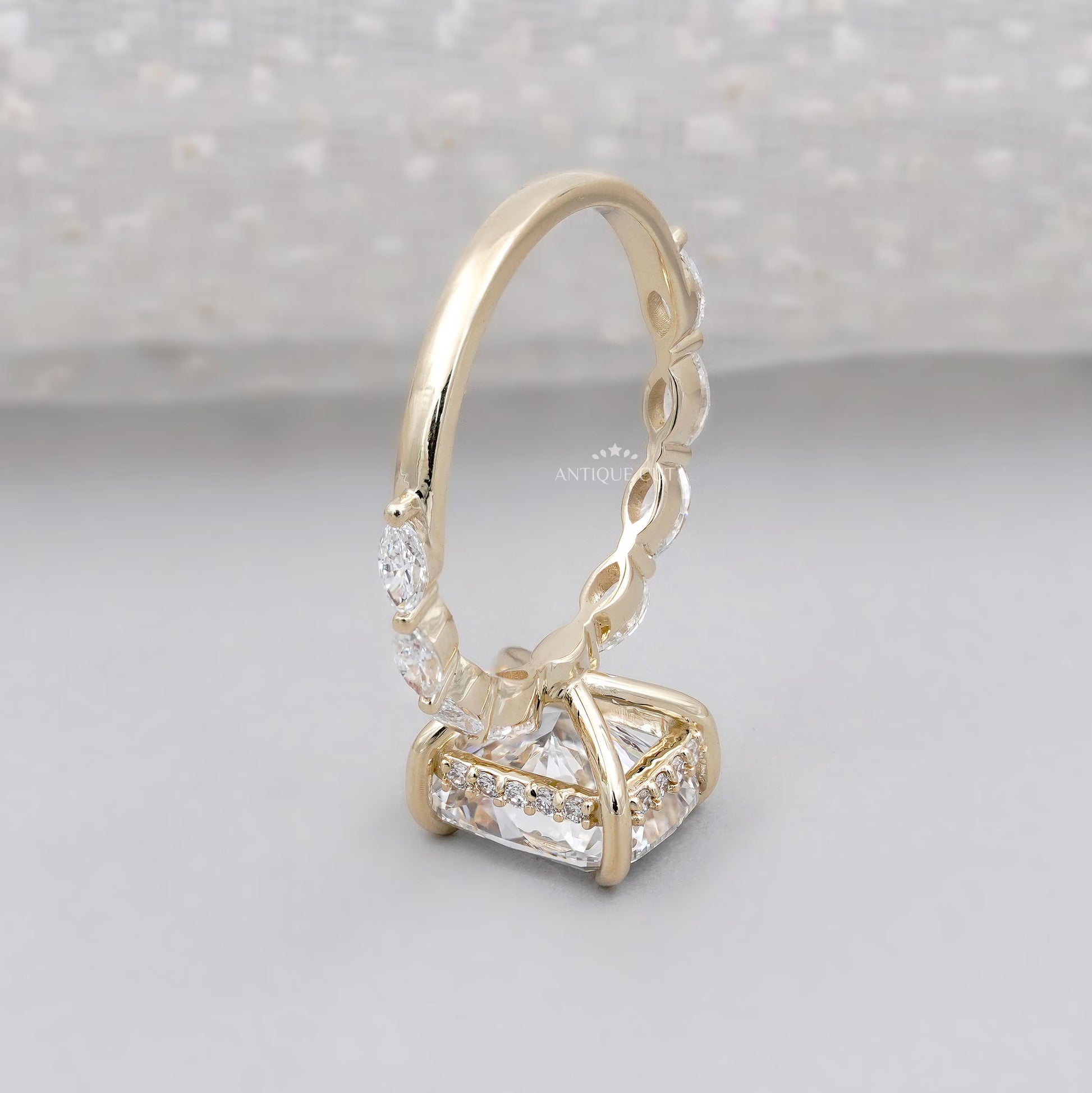Cushion diamond with subtle halo underneath