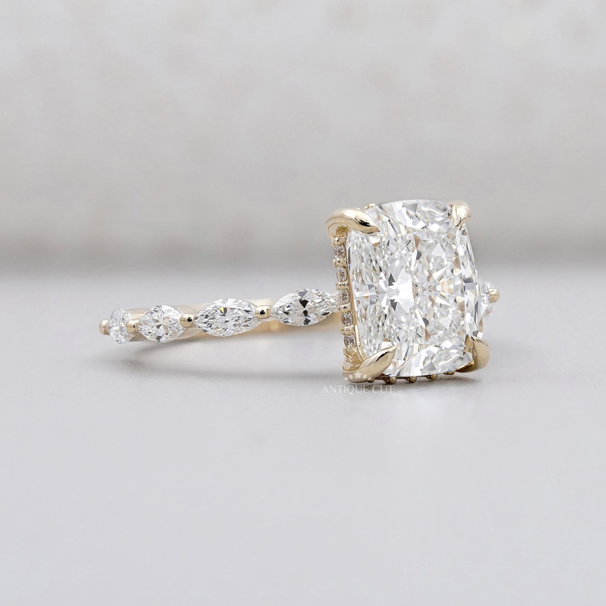 Yellow gold cushion engagement ring close-up