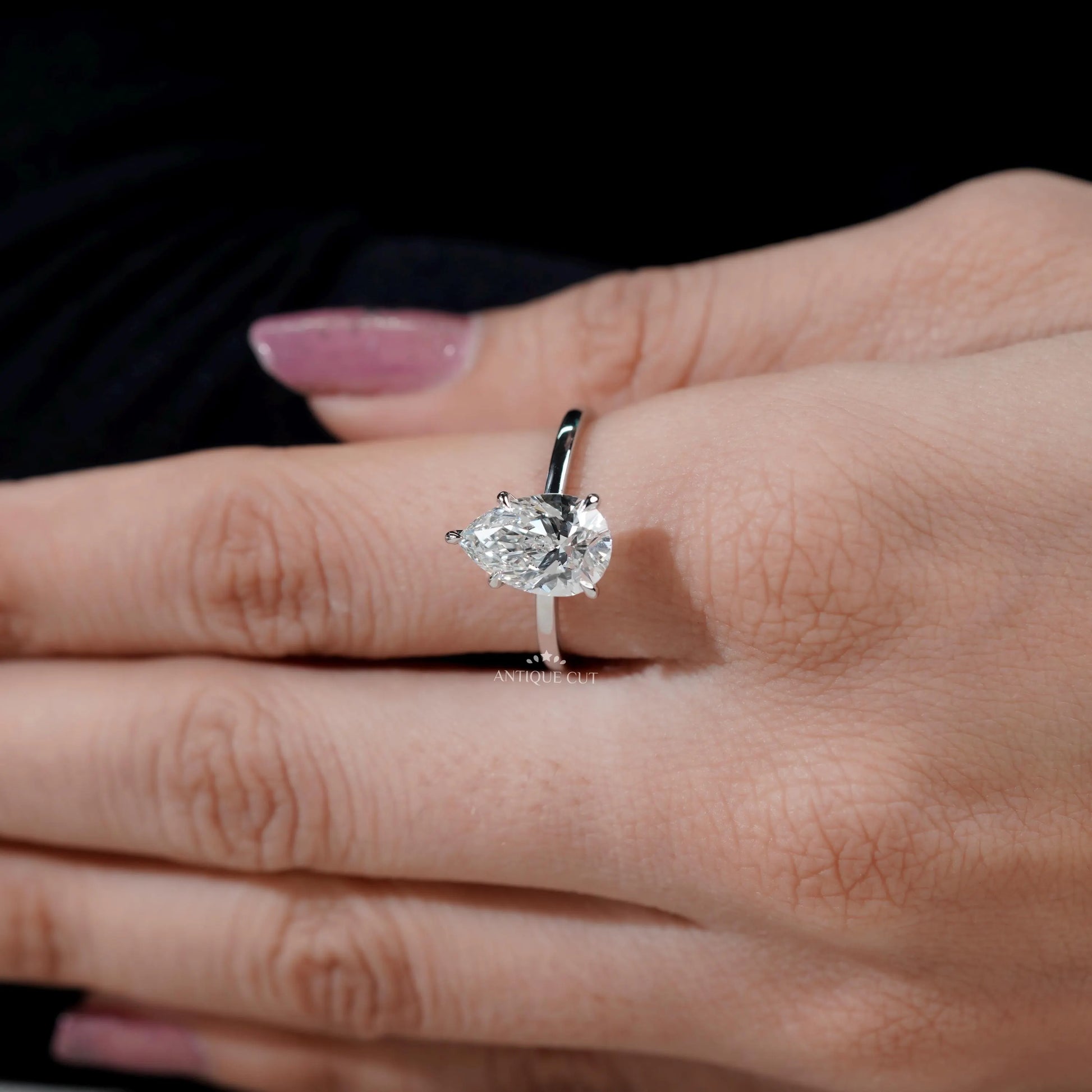 White gold pear solitaire ring