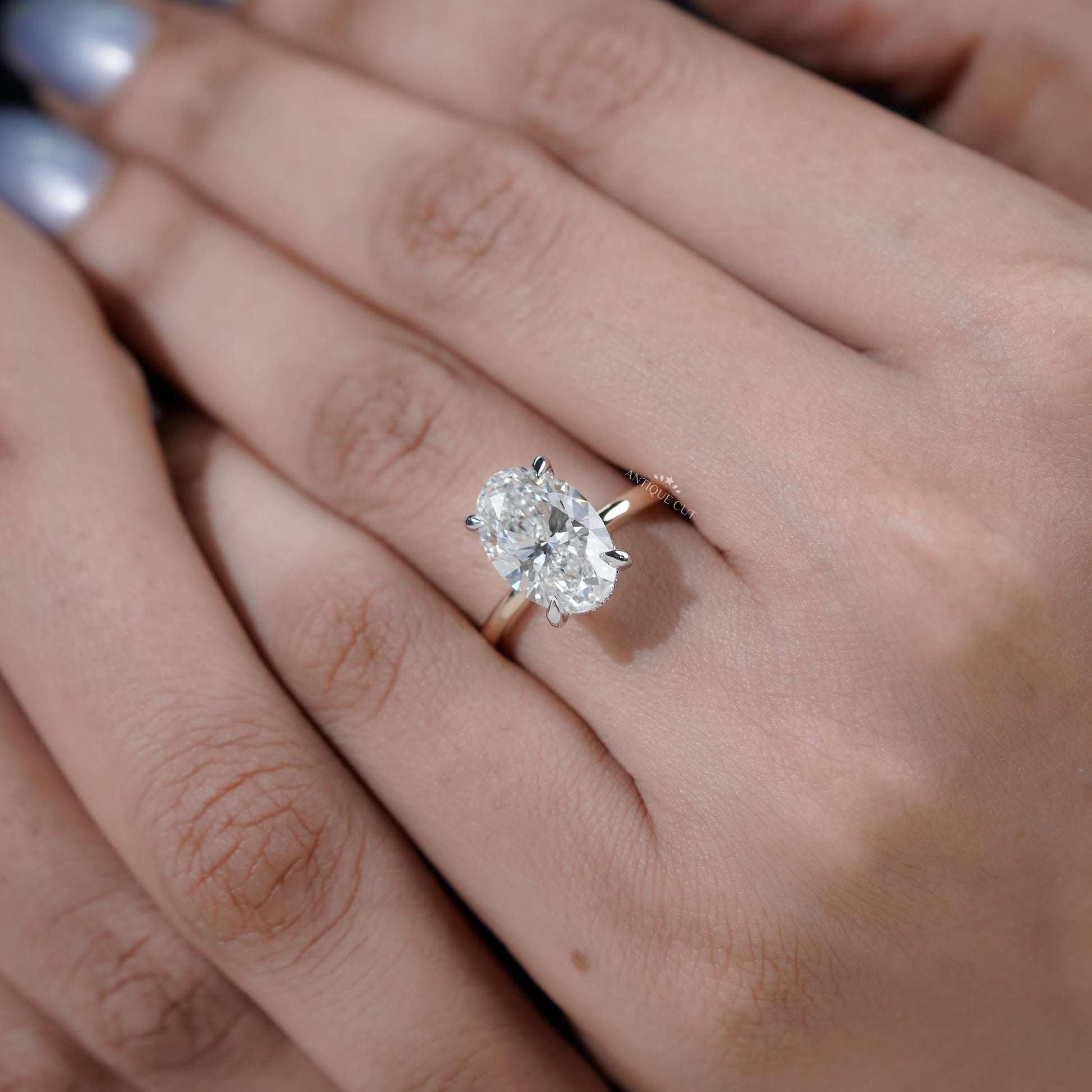 Bridal oval engagement ring yellow gold