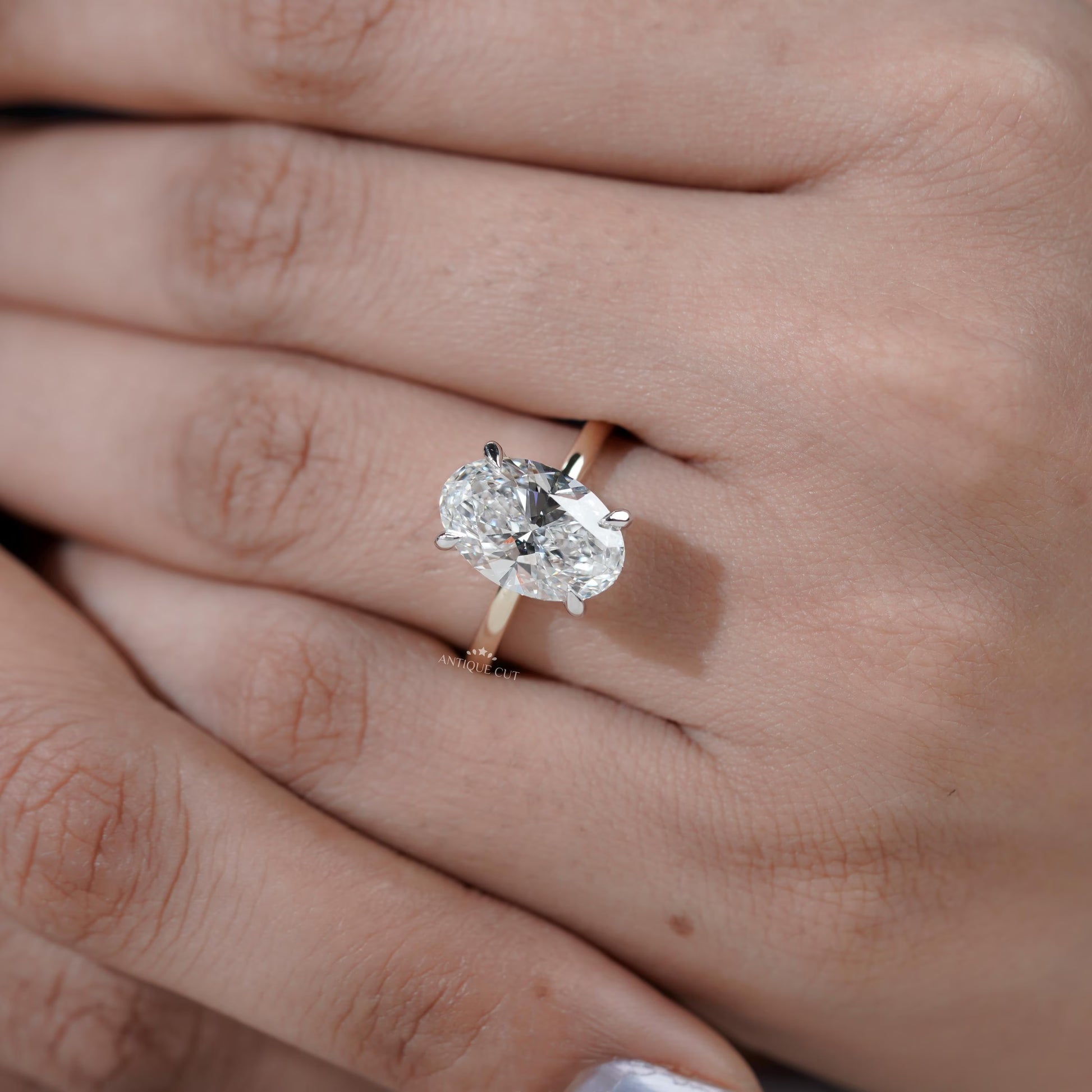 Elegant oval engagement ring hidden halo