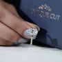 Yellow gold hidden halo engagement ring
