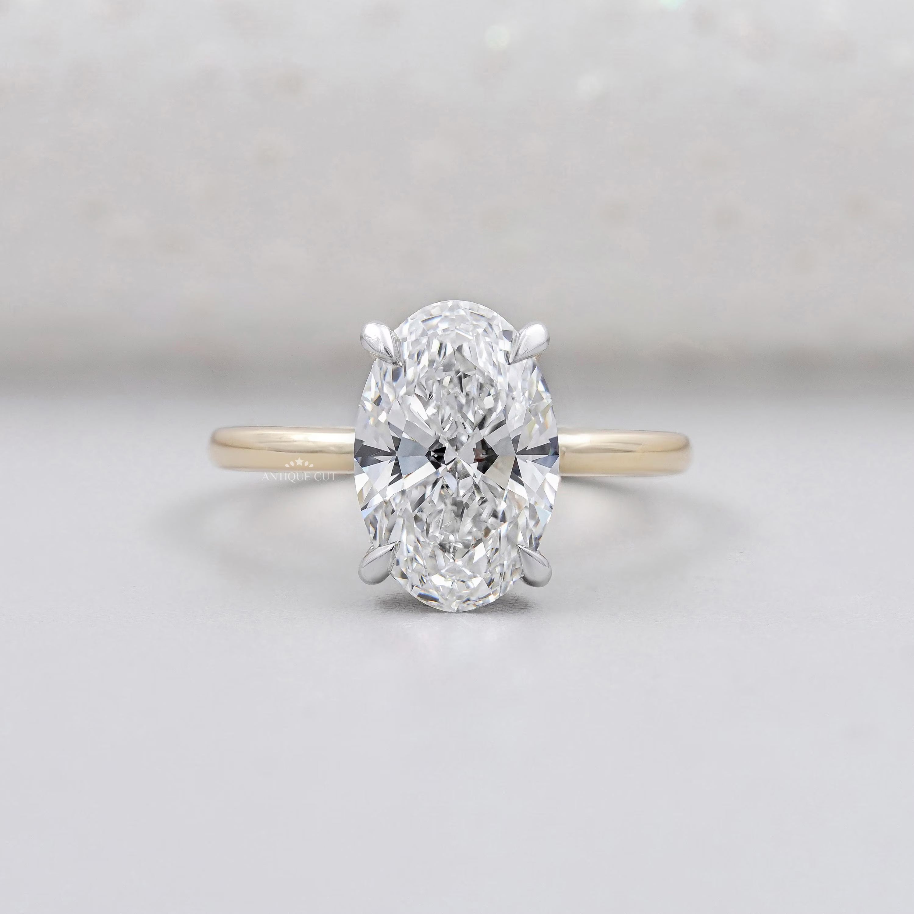 Oval cut engagement ring with hidden halo