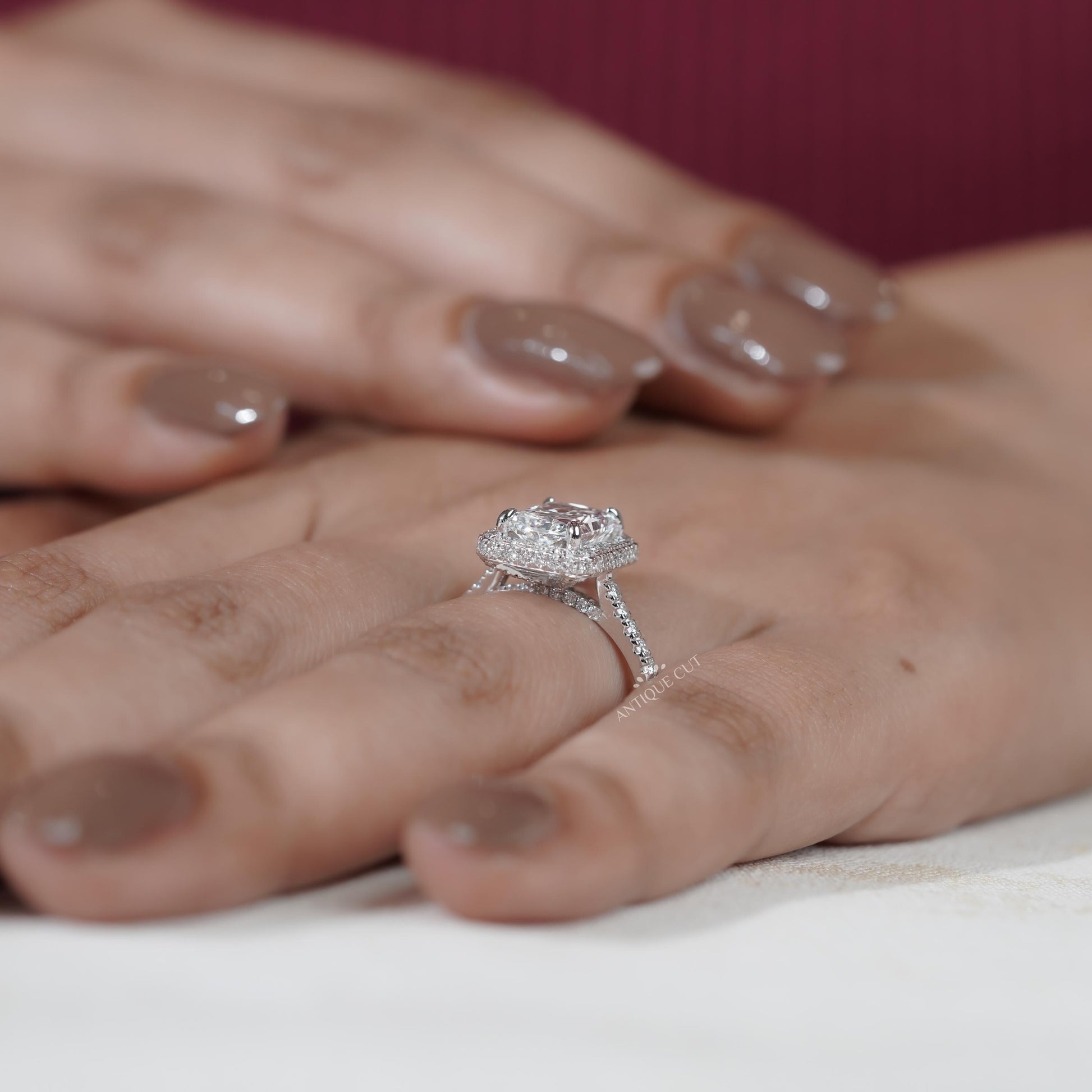 Classic white gold halo diamond ring