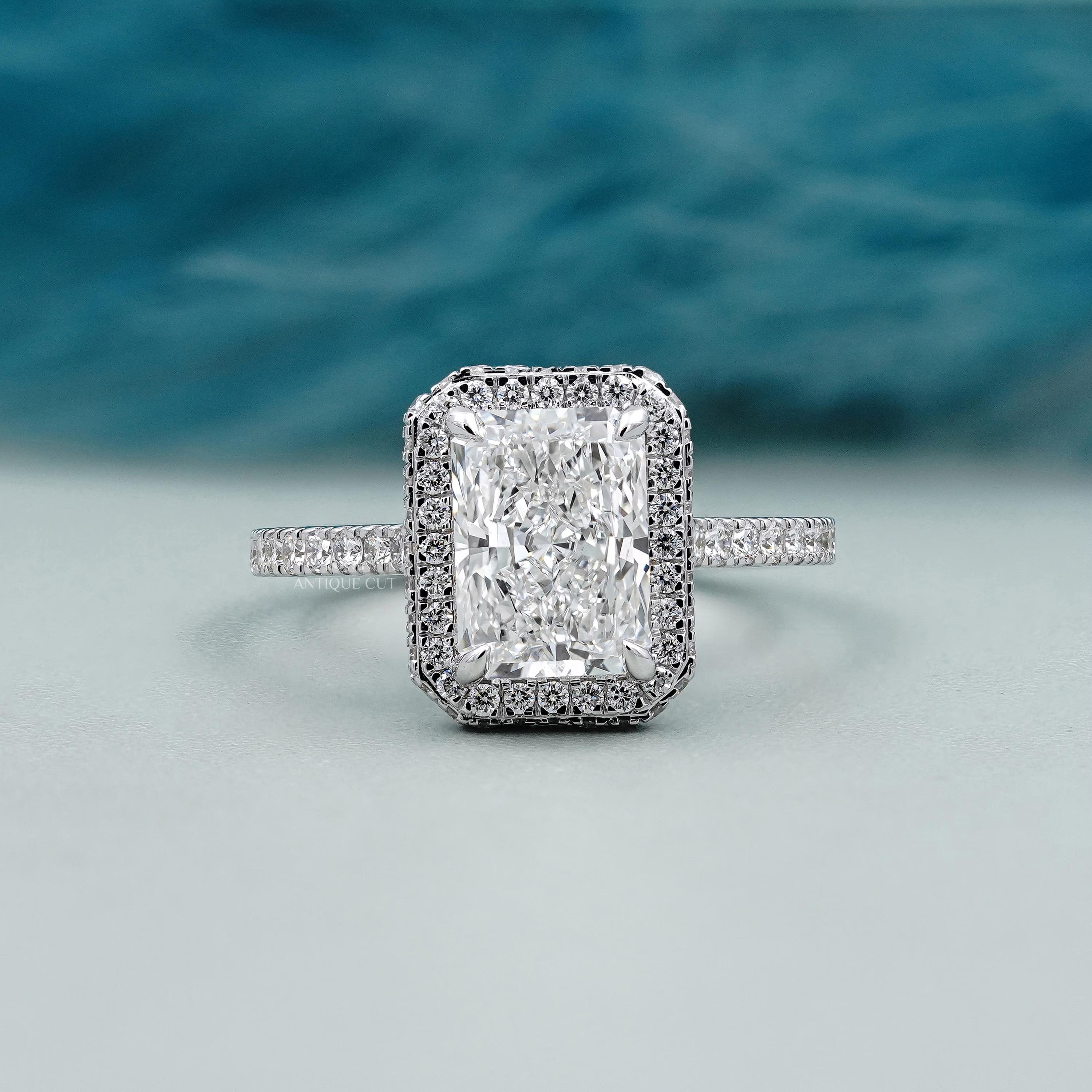 Radiant cut hidden halo diamond ring in white gold