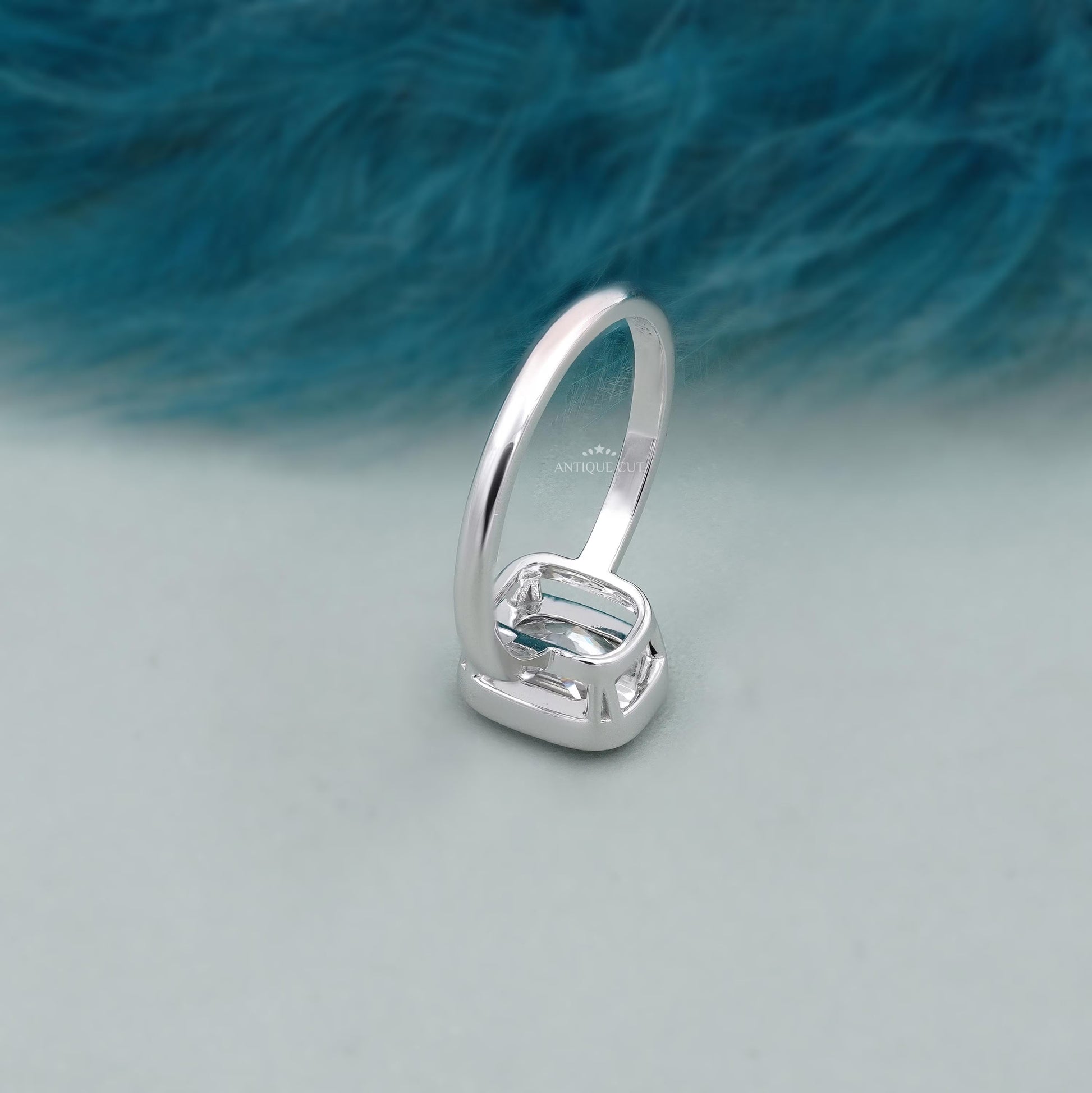 Cushion diamond ring with smooth bezel setting