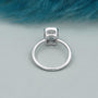 Cushion diamond ring with smooth bezel setting
