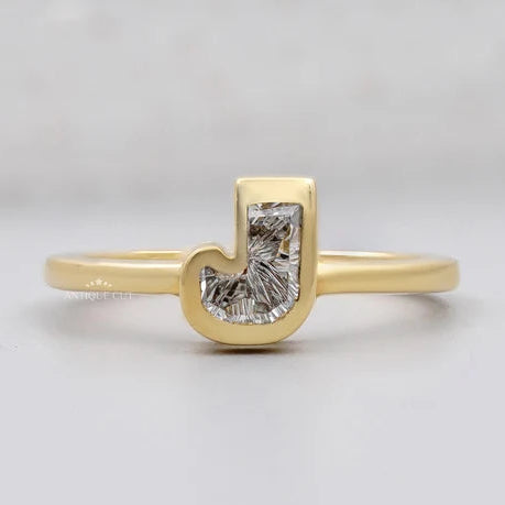 J shape initial ring with bezel set lab grown diamonds