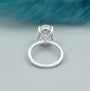 Elegant oval solitaire ring in white gold