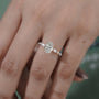 Marquise accent oval engagement ring