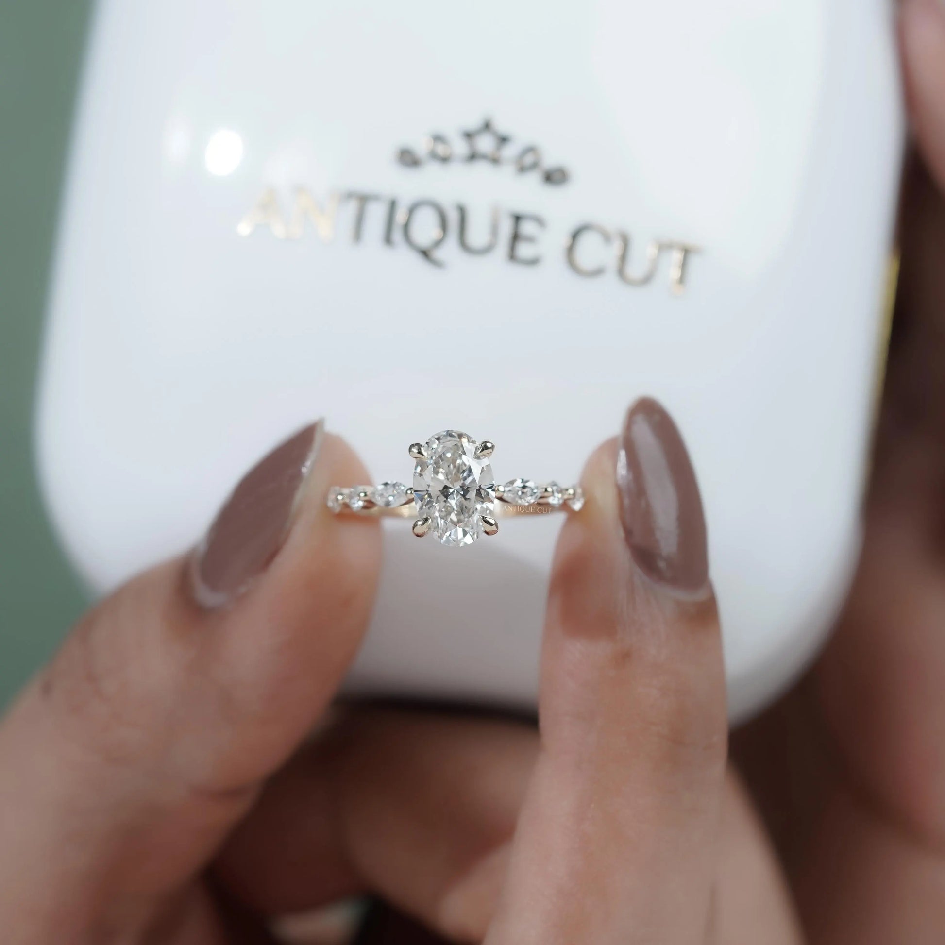 Wedding ring with marquise side detailing