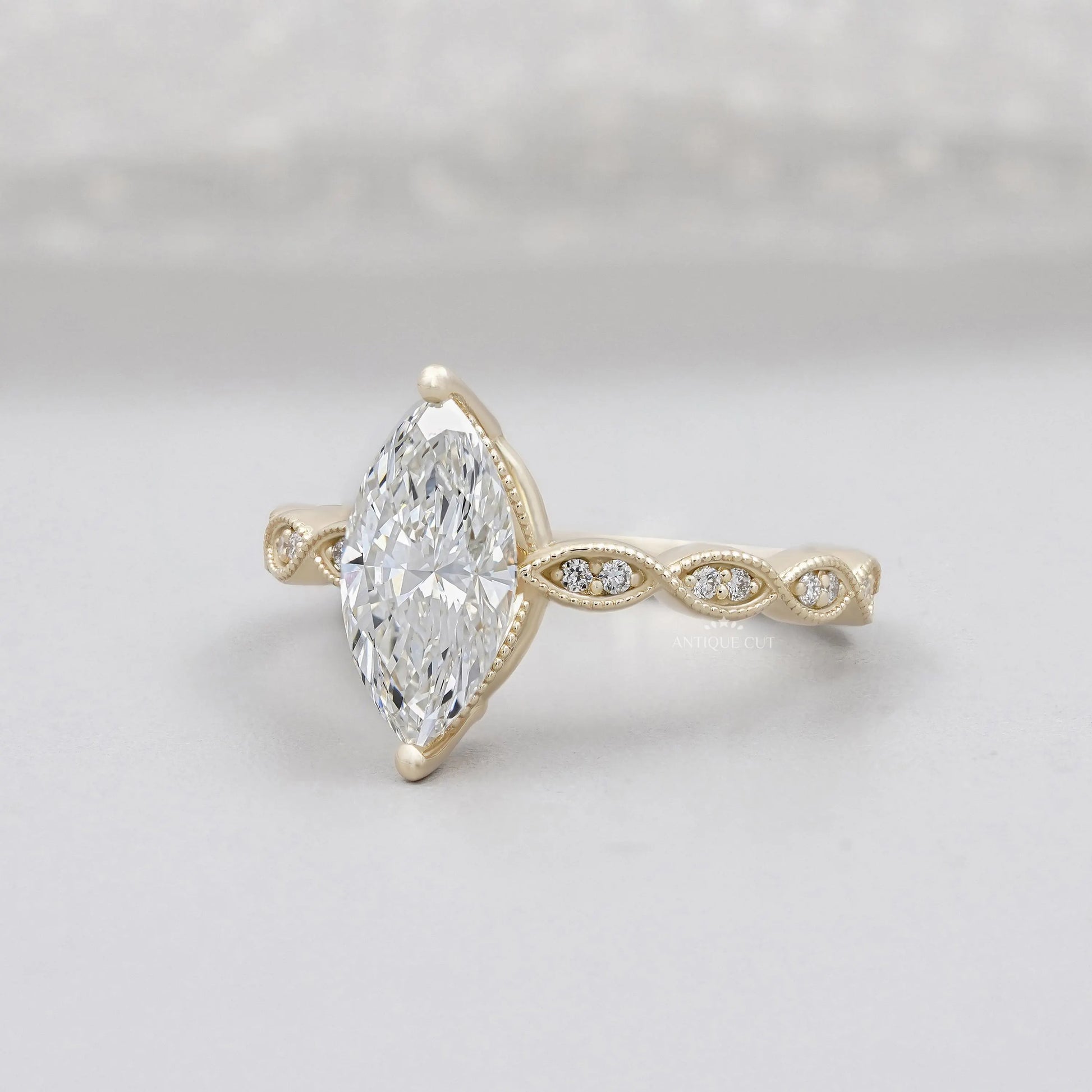 Yellow gold marquise diamond ring with vintage style setting