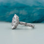 Marquise diamond ring with hidden halo round diamonds