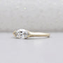 Horizontal marquise diamond engagement ring in yellow gold