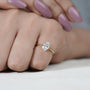 Modern six prong oval cut diamond ring