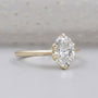 Oval cut lab grown diamond solitaire engagement ring with six prong setting