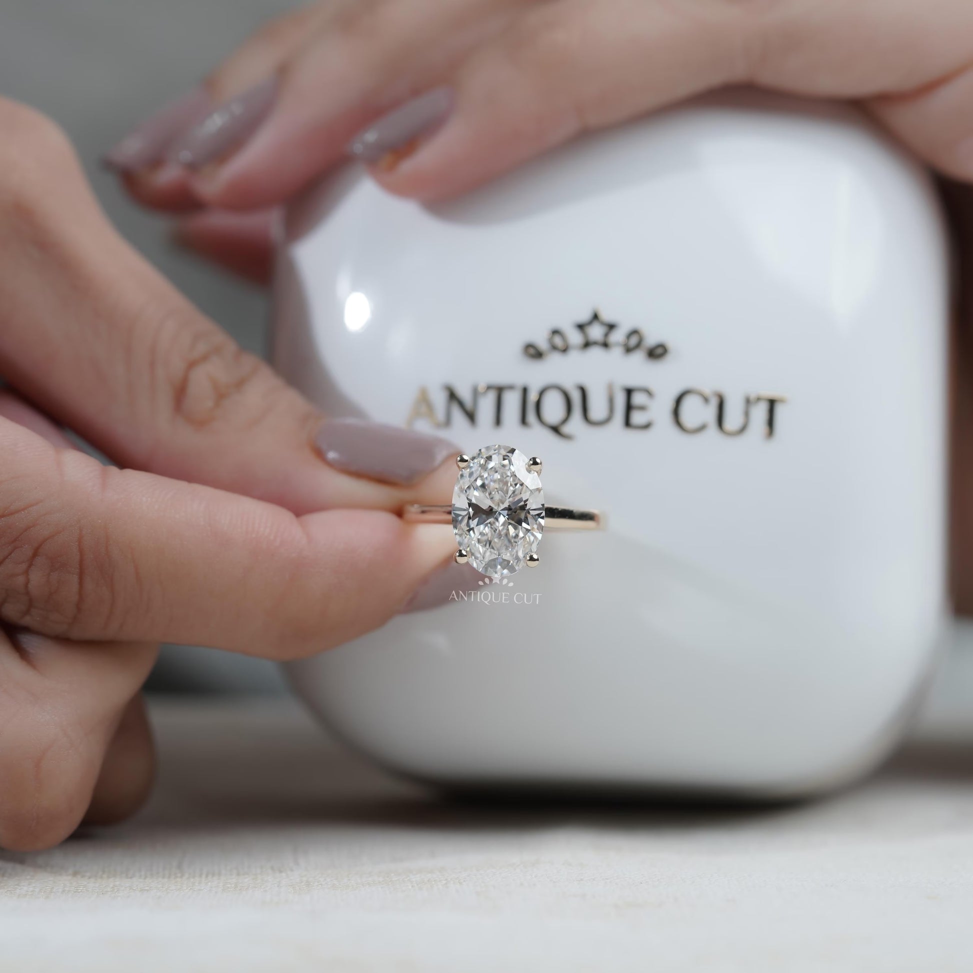 Classic oval solitaire engagement ring for women