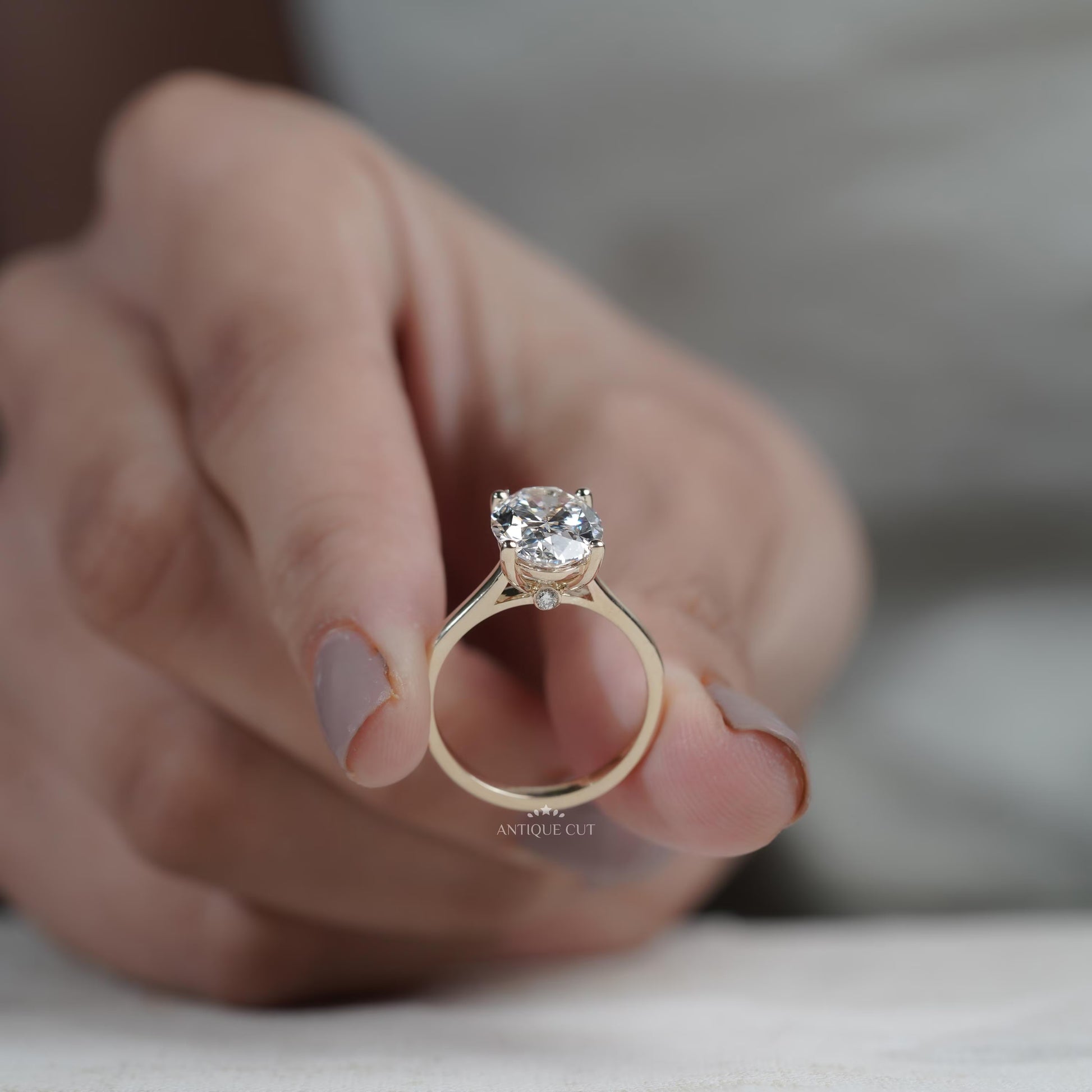 Lab grown oval diamond engagement ring with solitaire design