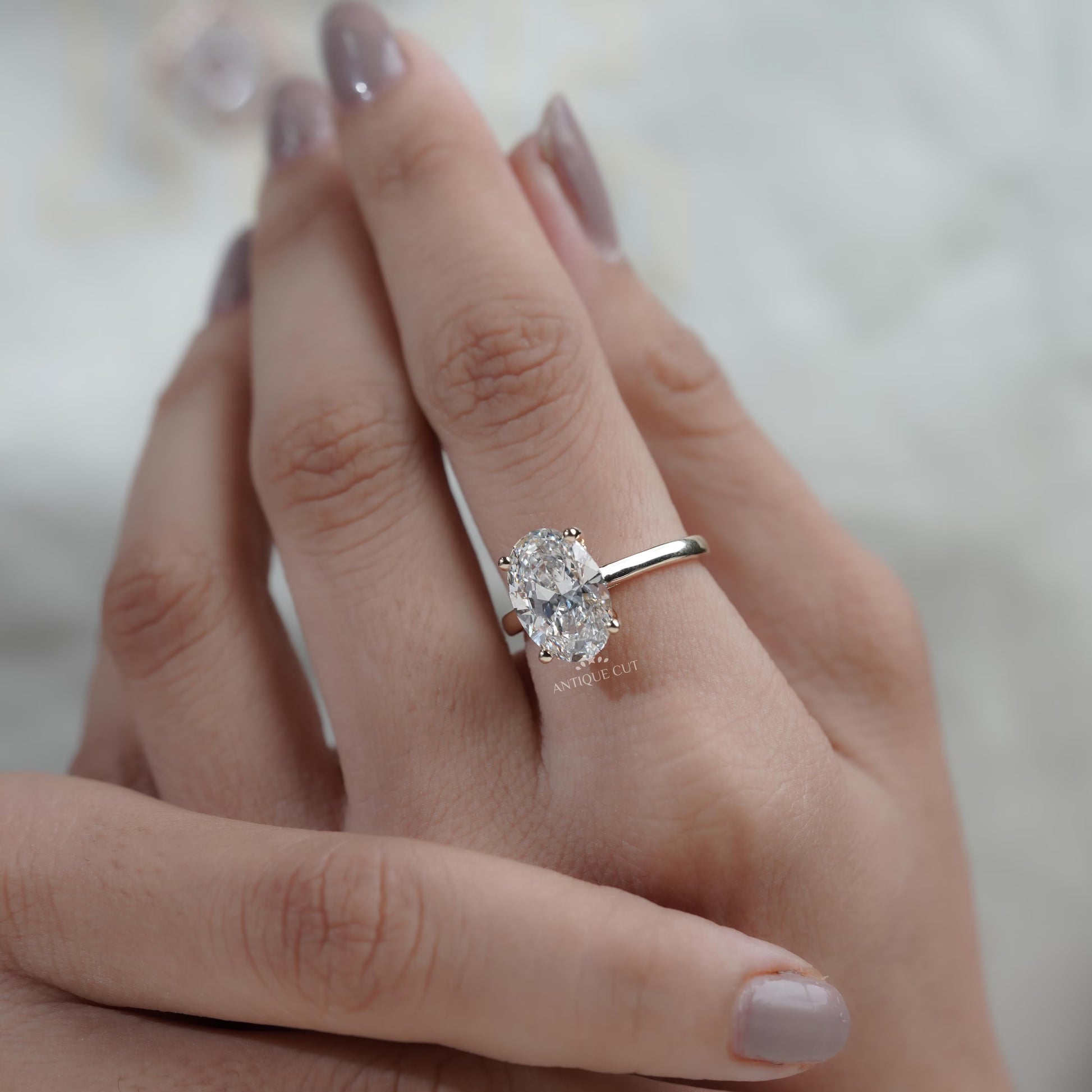 Yellow gold oval cut diamond solitaire bridal ring