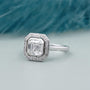 White gold Asscher diamond halo ring with bezel setting