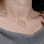 Teardrop pendant necklace with diamonds yellow gold