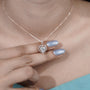 Stunning rose gold heart pendant with halo diamonds