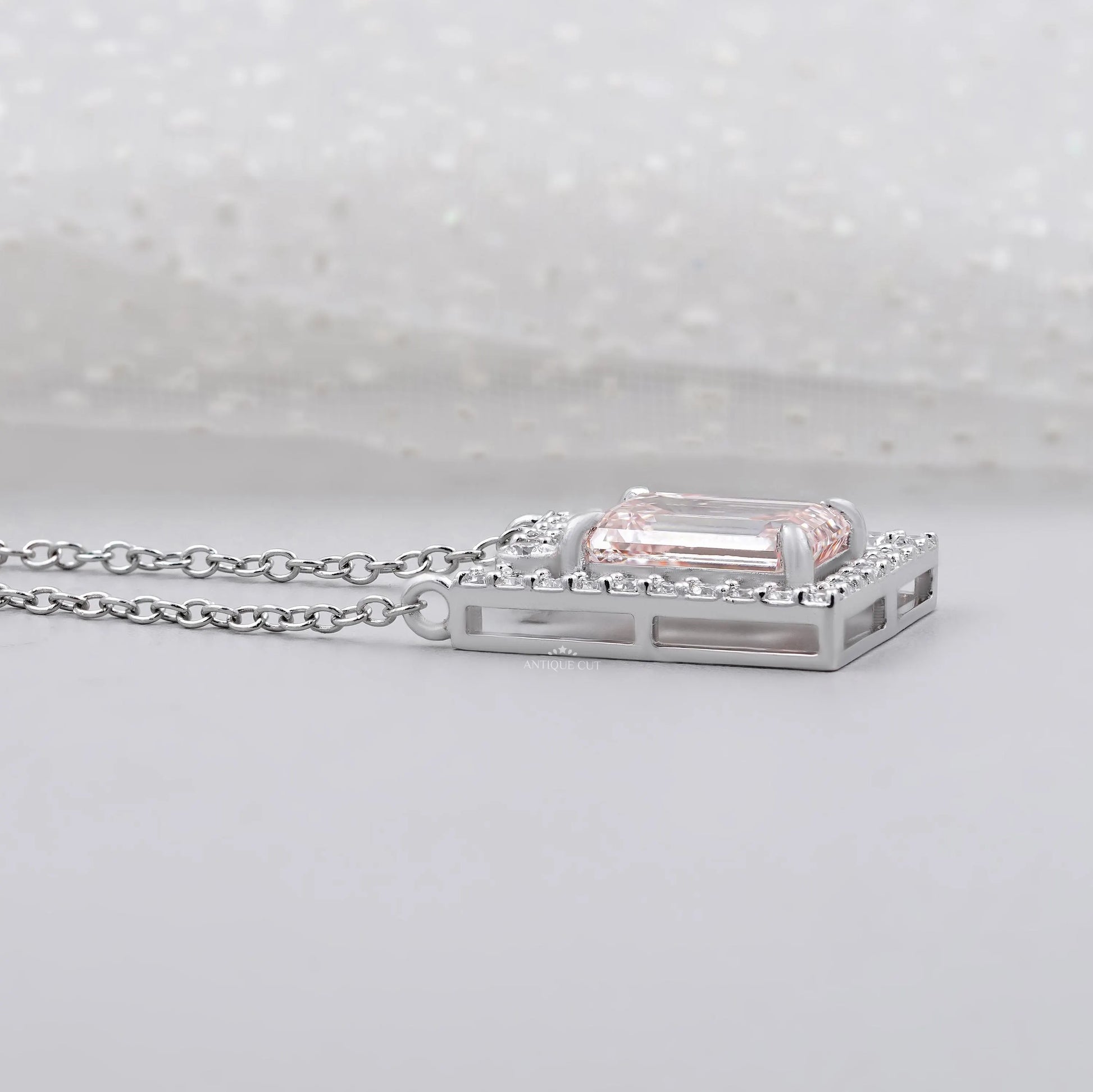 Modern emerald frame pendant with diamond