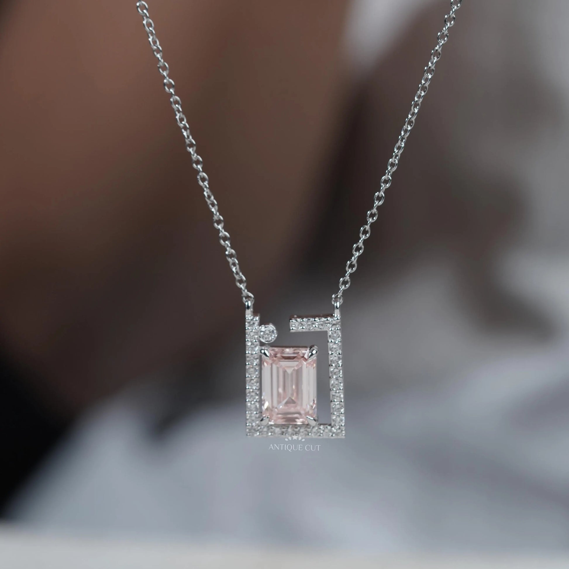 White gold emerald pendant with lab grown diamonds
