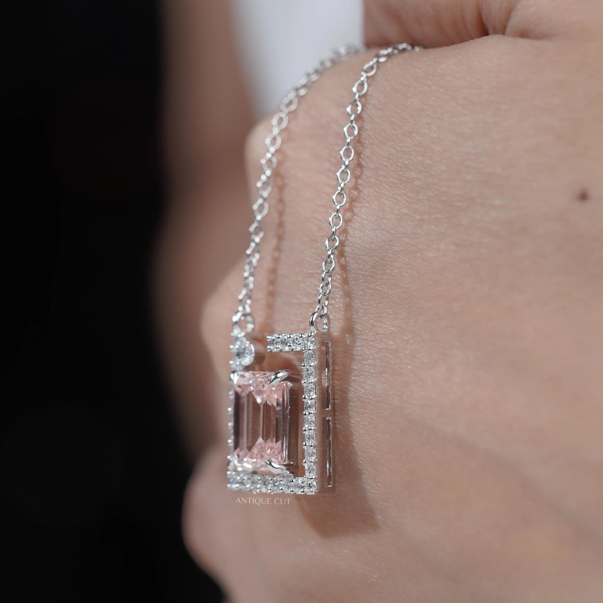 Sleek emerald frame pendant with diamond accents