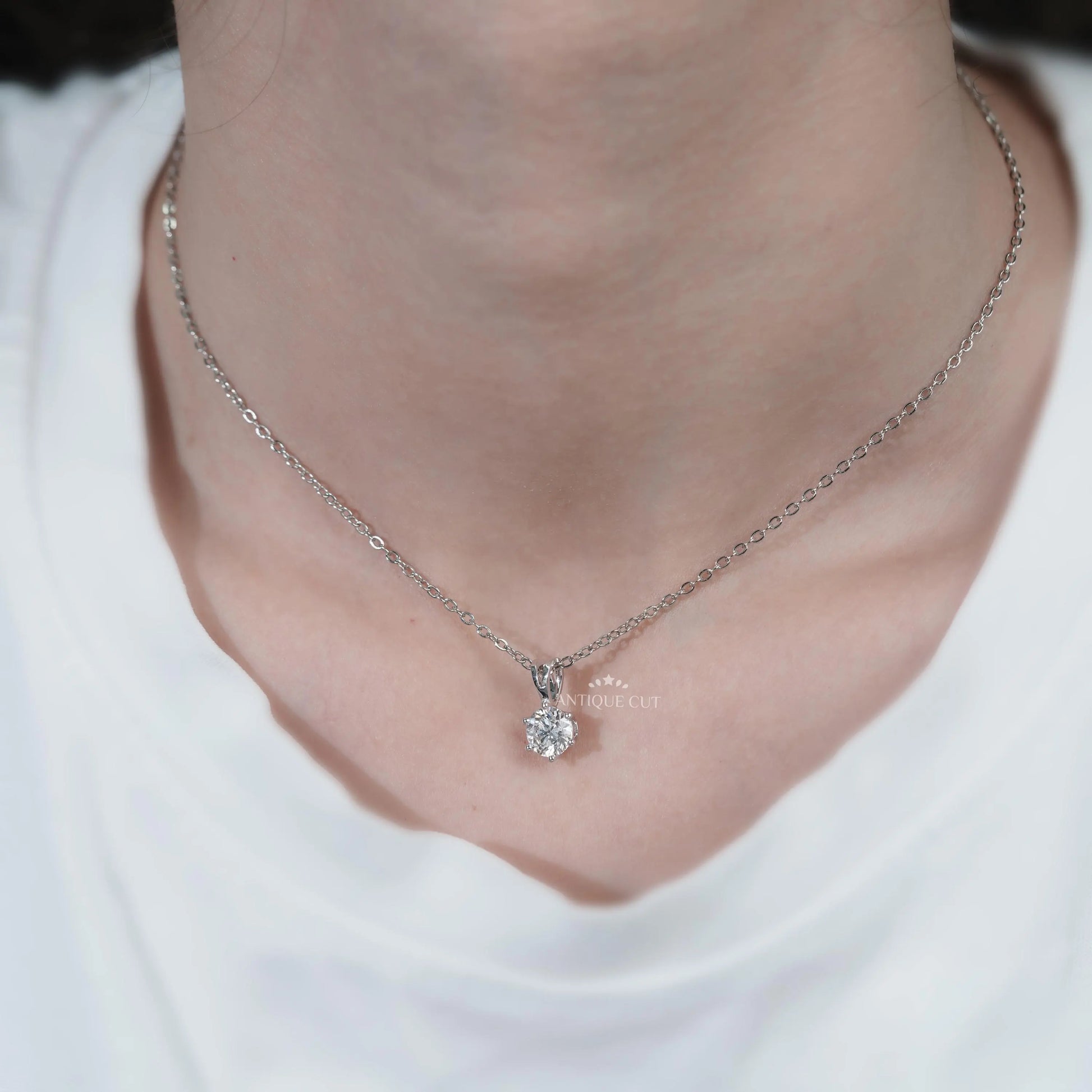 White and yellow gold solitaire diamond pendant