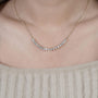 Contemporary round diamond curved pendant