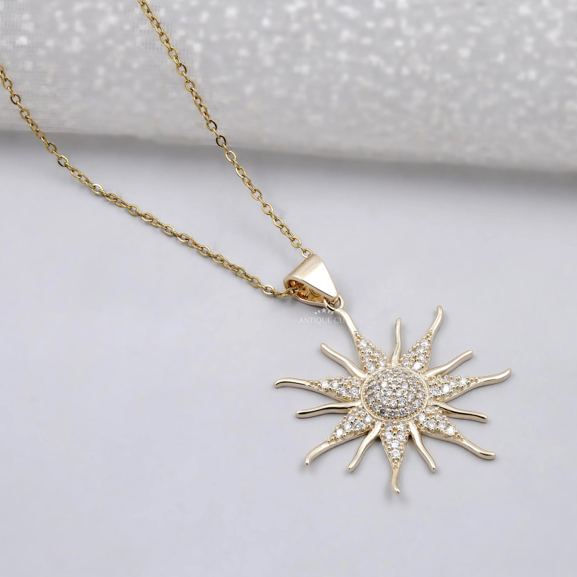 Elegant round diamond sunburst necklace