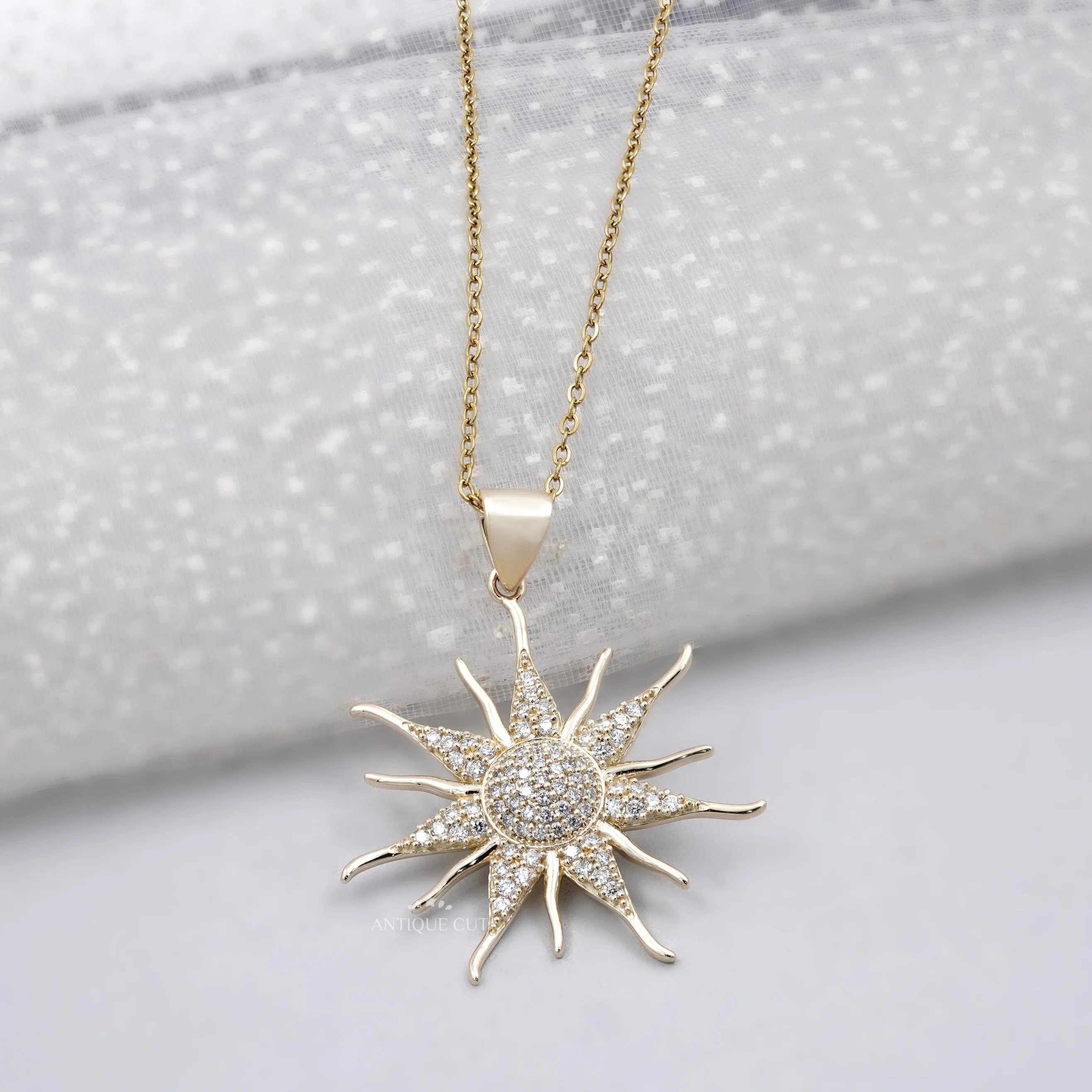 Round lab grown diamond sunburst pendant in yellow gold