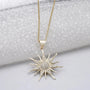 Round lab grown diamond sunburst pendant in yellow gold