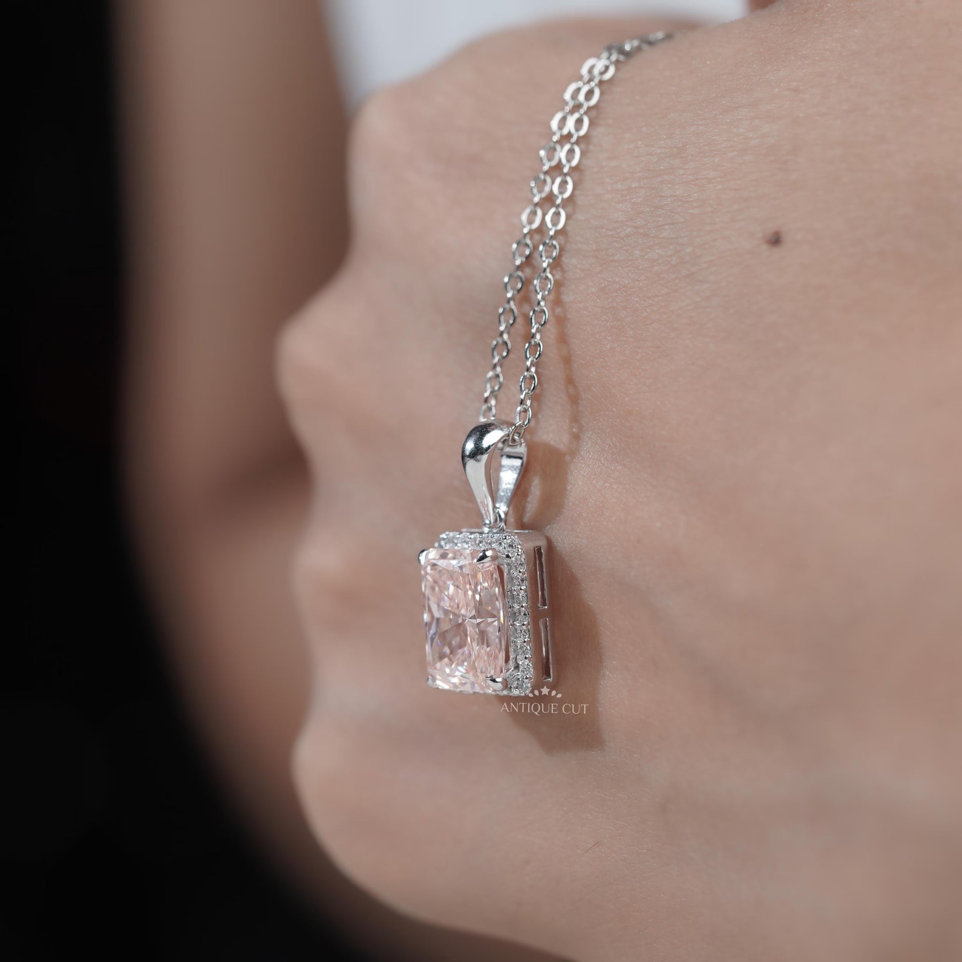 Modern pink diamond halo pendant white gold