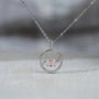White gold swirl circle pendant with Asscher diamond