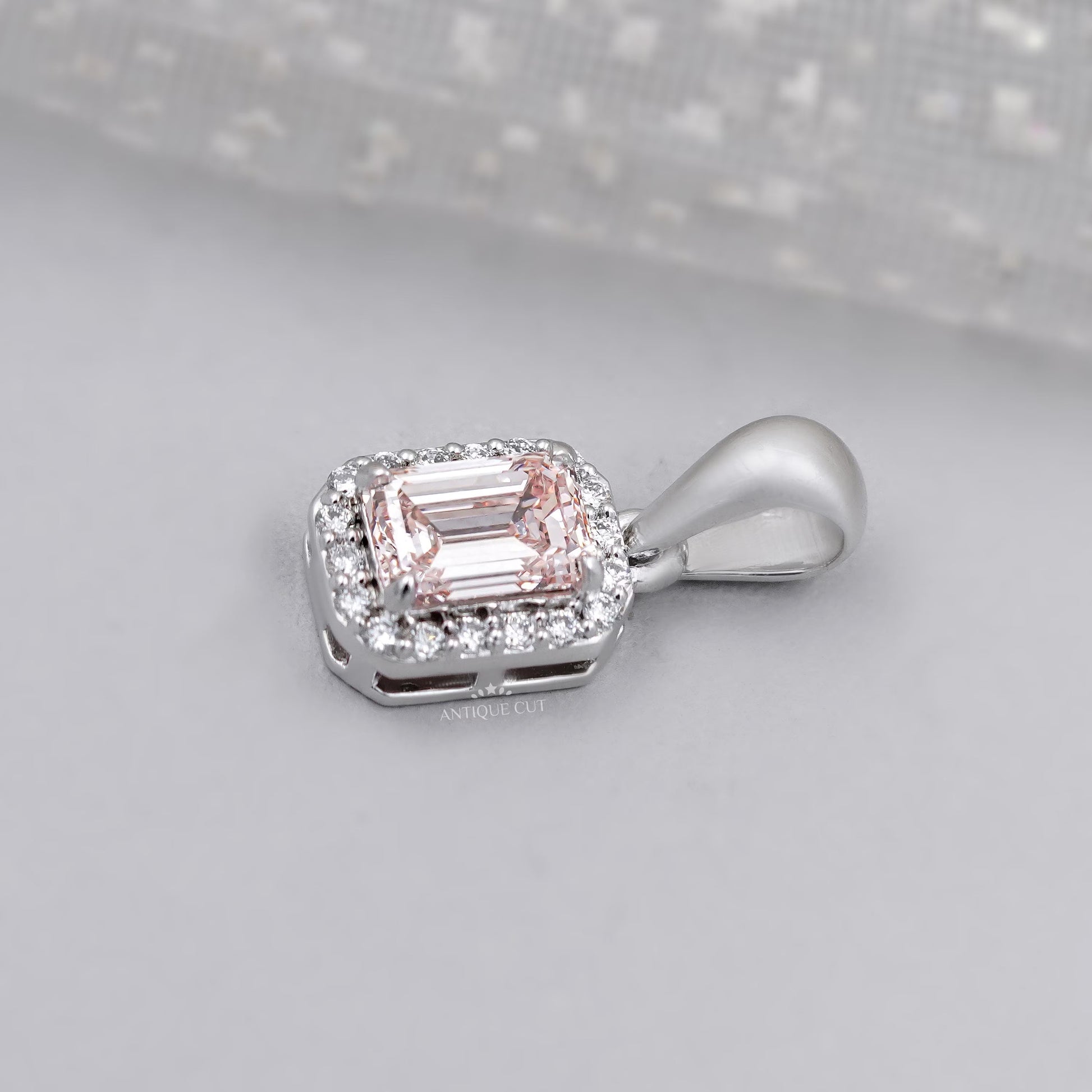 White gold emerald cut halo diamond necklace