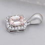 Close up of emerald cut halo diamond pendant