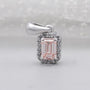 Classic emerald cut halo diamond pendant in white gold