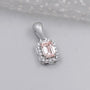 Antiquecut emerald cut halo pendant