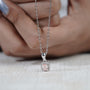 Elegant emerald cut halo pendant necklace