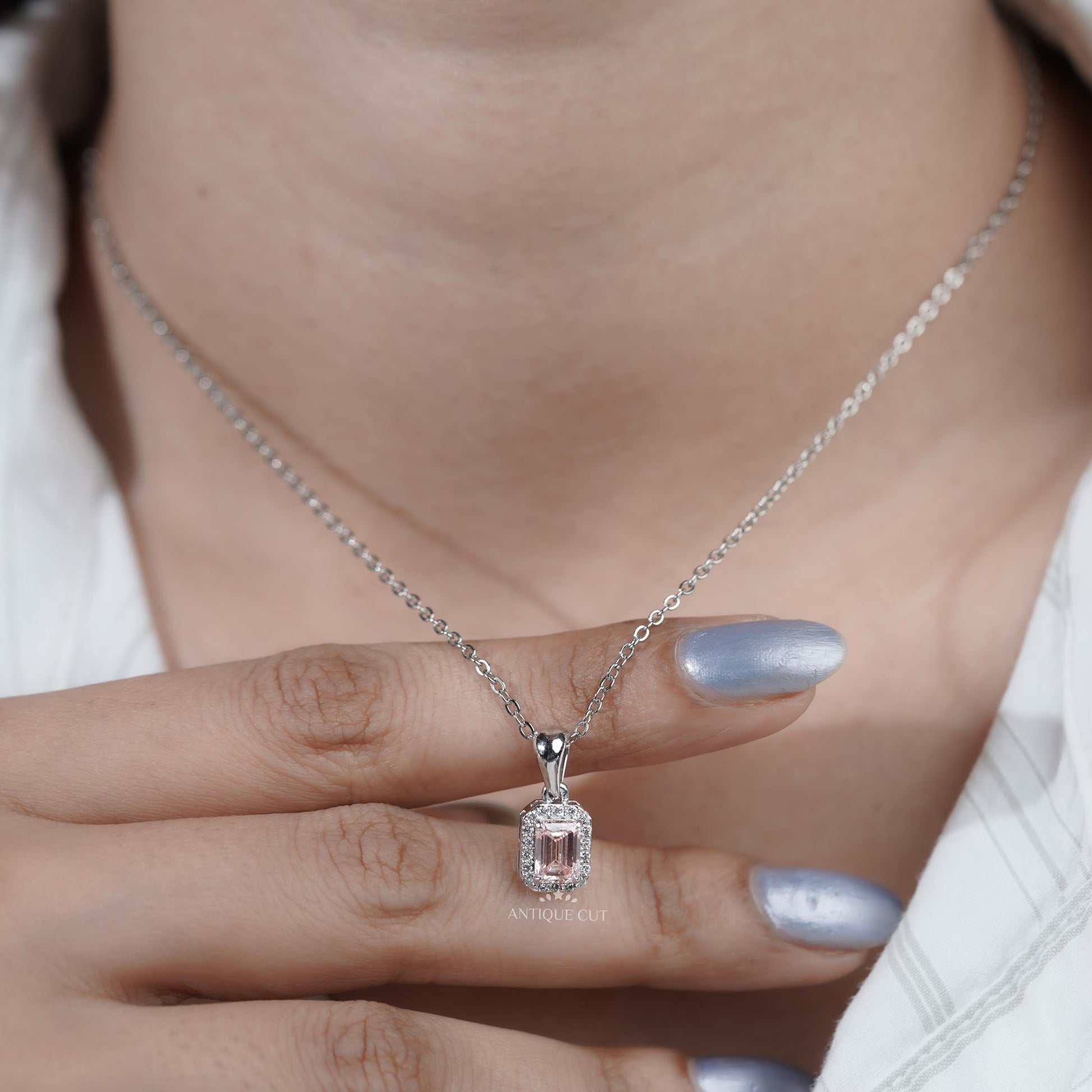 Antiquecut engagement pendant emerald halo design