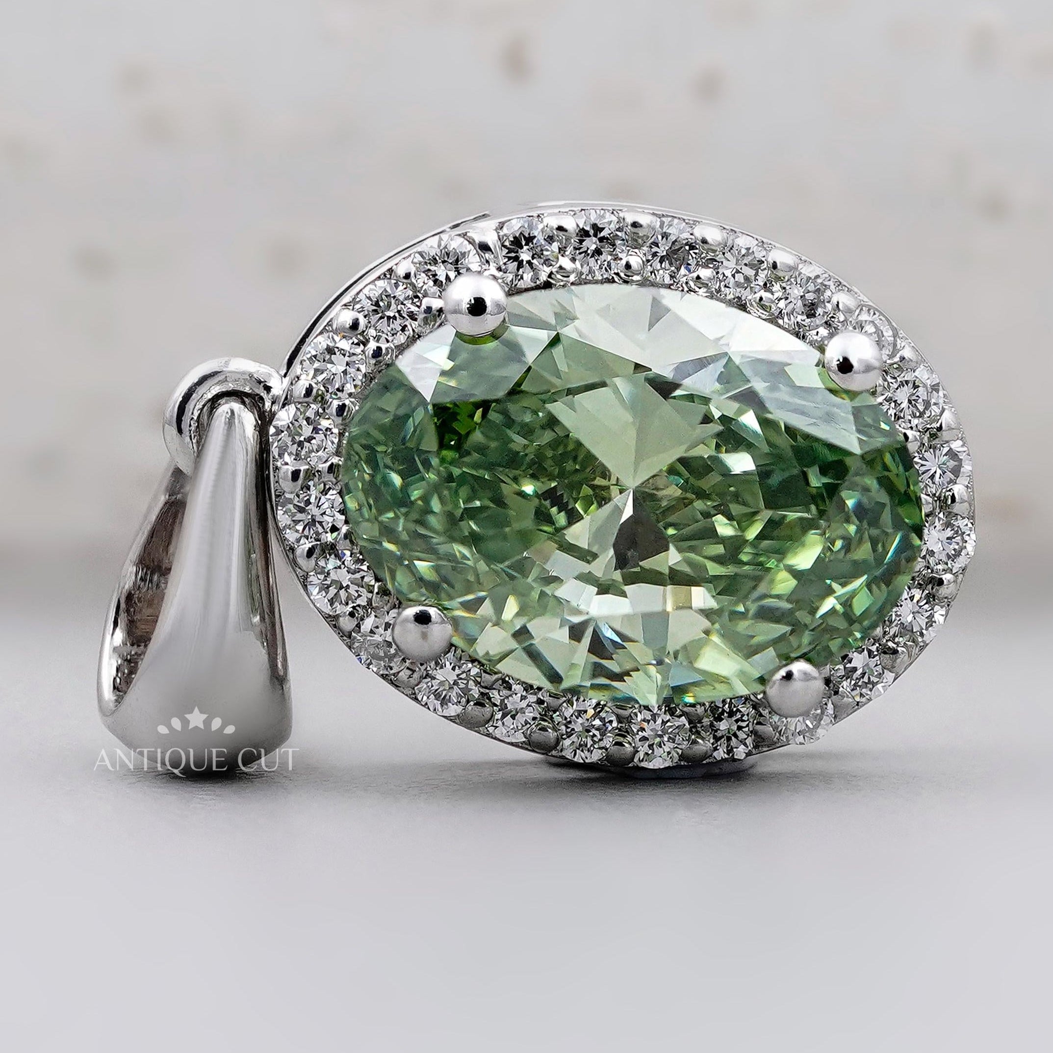 White gold oval green diamond necklace