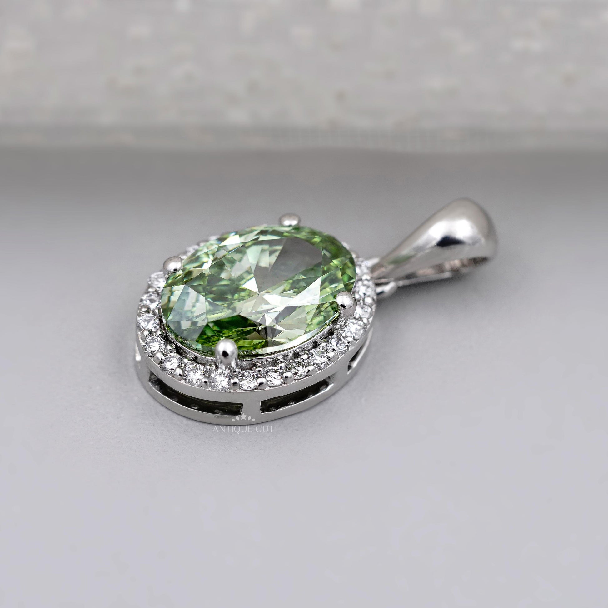 IGI certified oval green diamond pendant